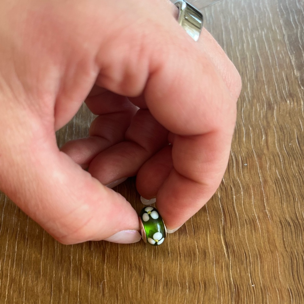 Green glass charm